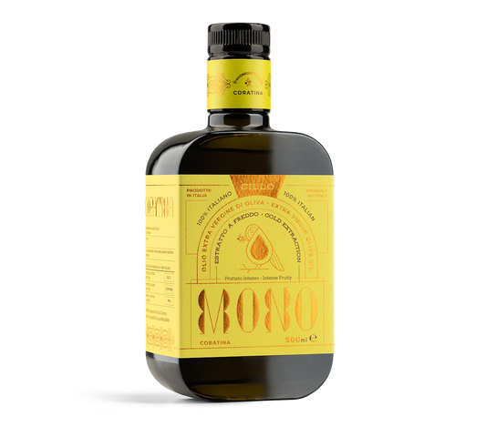 Bottle of olive oil with a yellow label on a white background