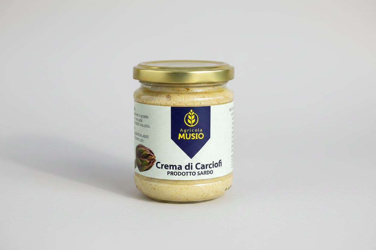 Jar of 'Crema di Carciofi' artichoke spread on a wooden surface with a blurred green background