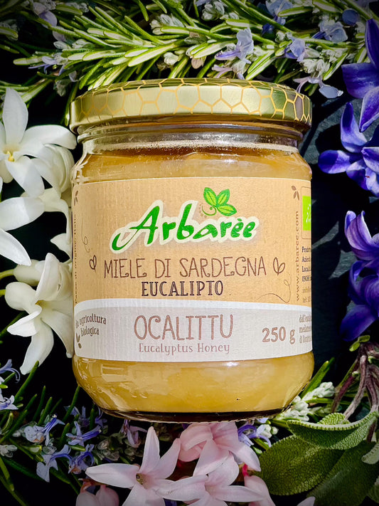 Glas Eukalyptushonig mit floralem Hintergrund