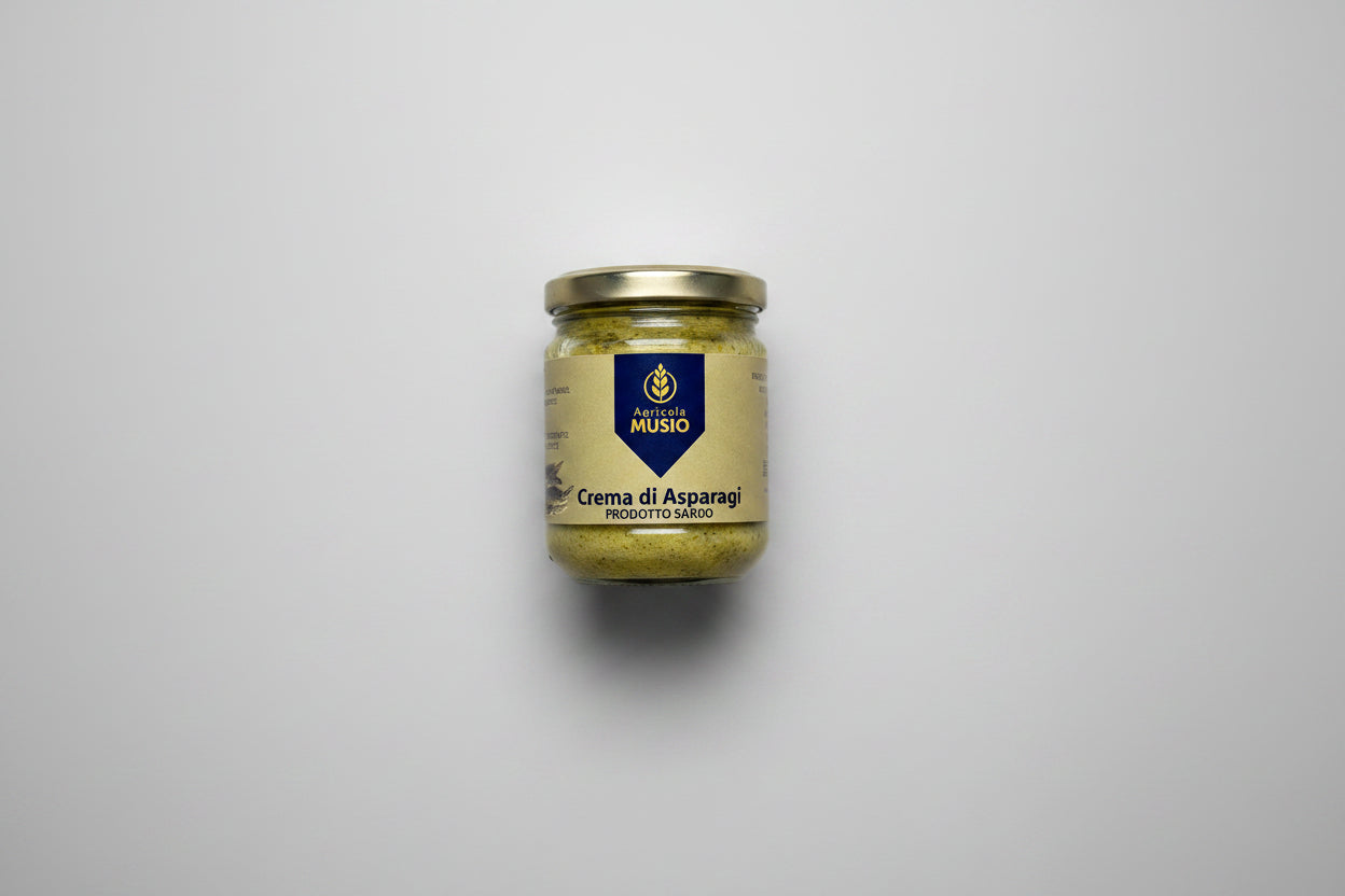 Glas of Sardinian green asparagus spread on a gray background