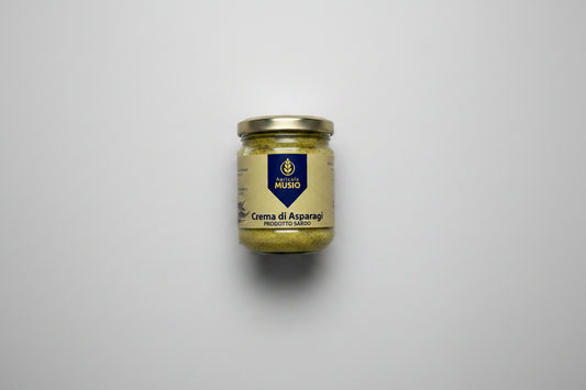 Glas of Sardinian green asparagus spread on a gray background